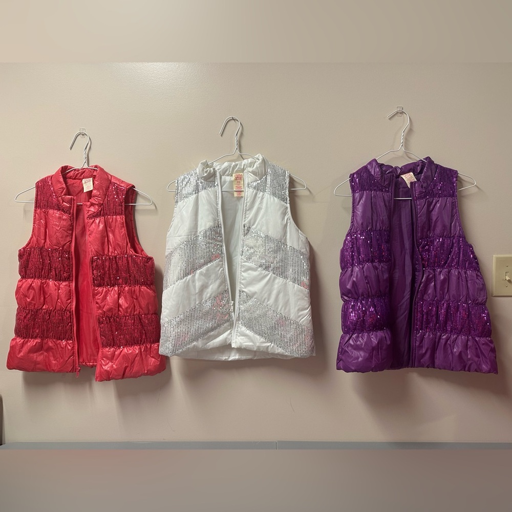 Pink, White, and Purple Puffer Vests